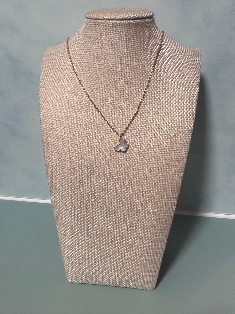 Delicate Gold Butterfly Pendant Necklace in White Accent